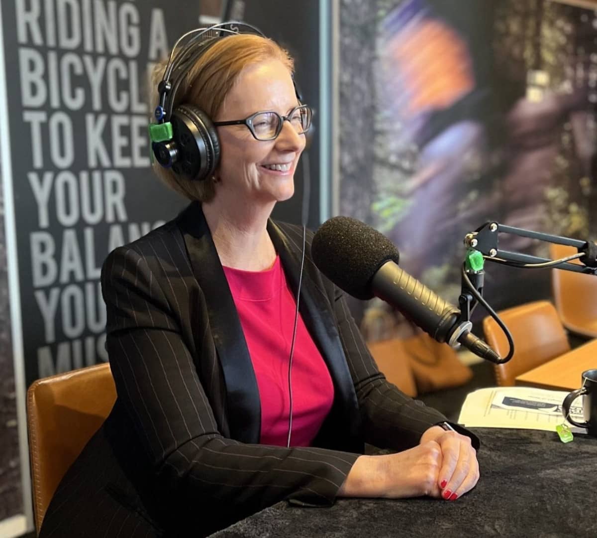 Former Prime Minister Julia Gillard Smiling while recording her podcast